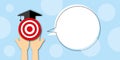 Hands holding red target with graduation cap and speech bubble. Concept for studying, education and e-learning.