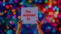 Hands Holding Sign Announcing Winner Royalty Free Stock Photo