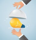 Hands holding silver cloche with light bulb. serving creative idea concept vector illustration EPS10