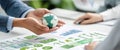 Generative AI Business Meeting with Globe Earth Model and Charts for Sustainability Strategy Planning business con Royalty Free Stock Photo