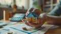 Hands Holding Miniature House. AI generated Royalty Free Stock Photo
