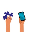 Hands holding smartphone and hashtag