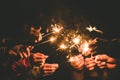 Hands holding sparklers for celebrate in the night time Royalty Free Stock Photo