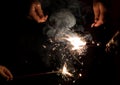 Hands holding sparklers Royalty Free Stock Photo