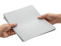 Hands holding a stack of blank paper sheets Royalty Free Stock Photo