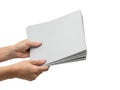Hands holding a stack of blank white paper sheets Royalty Free Stock Photo