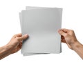 Hands holding stack of gray paper sheets Royalty Free Stock Photo