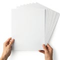 Hands holding a stack of white paper Royalty Free Stock Photo