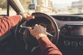 Hands holding steering wheel Royalty Free Stock Photo