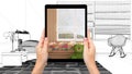 Hands holding tablet showing colored kids bedroom. Blueprint CAD sketch background, augmented reality concept, application to