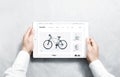 Hands holding tablet with sport webstore mock up on screen Royalty Free Stock Photo