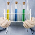 Hands holding test tubes Royalty Free Stock Photo