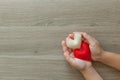 Hands holding two hearts, health care, love, organ donation, CSR concept, world heart day, world health day Royalty Free Stock Photo