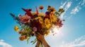 Hands holding a vibrant bouquet of wildflowers on a bright blue sky background. Generative AI Royalty Free Stock Photo