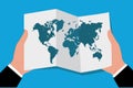 Hands holding world map in flat style, vector illustration Royalty Free Stock Photo