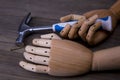 Hands holds a hammer and nails Royalty Free Stock Photo