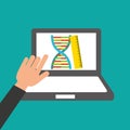 Hands holds laptop-genetics online education