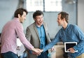 Hands in a huddle as a business man and his colleagues or coworkers cheer and celebrate success, a win or career Royalty Free Stock Photo