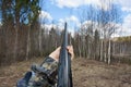 Hands of hunter waiting a prey with shotgun