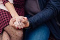 Hands of inloved couple holding each other Royalty Free Stock Photo