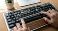 Person's hands interacting with a holographic error message showing 'Eco-System Failure' above a keyboard. Royalty Free Stock Photo