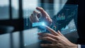 Hands interacting with a futuristic digital interface displaying Reg Tech and compliance data with charts Royalty Free Stock Photo