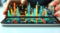 Hands interacting with digital data graphs on tablet Royalty Free Stock Photo