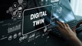 Hands Interacting with Digital Twin Technology Concept on Laptop Screen with Data Visualizations and Infographics Royalty Free Stock Photo
