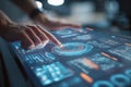 Hands interacting with a futuristic touchscreen interface displaying digital data and holographic graphics Royalty Free Stock Photo