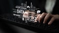 Hands on Keyboard with Data Analytics Concepts, Machine Learning, Cloud Computing, and Big Data Visualized in a Modern Royalty Free Stock Photo