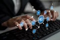 Hands on a Keyboard with Digital Network Connections and Icons Representing Data Communication and Technology in a Royalty Free Stock Photo
