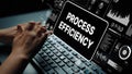 Hands on Keyboard with Process Efficiency Concept in Digital Workspace Featuring Data Charts and Graphs for Business Royalty Free Stock Photo