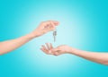 Hands with keys, give keys in hand Royalty Free Stock Photo