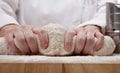 Hands kneading bread dough Royalty Free Stock Photo