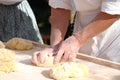 Hands kneading bread dough Royalty Free Stock Photo