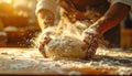 Hands Kneading Dough in a Bakery Kitchen for Fresh Bread Making Royalty Free Stock Photo