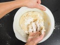 Hands kneading sticky dough Royalty Free Stock Photo