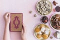 hands with koran sweets. High quality photo