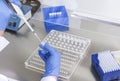 hands of a lab technician with a tube of blood sample Royalty Free Stock Photo