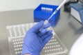 Doctor holding blood tube test in the research laboratory. Royalty Free Stock Photo