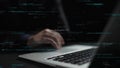 Hands on Laptop Keyboard with Coding Text Overlay Representing Software Development, Programming, cyber security, and Royalty Free Stock Photo