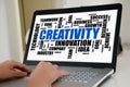 Creativity word cloud concept on a laptop screen Royalty Free Stock Photo