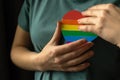 Hands with LGBT rainbow heart. Concept of LGBTQ people, gay pride, LGBT rights Royalty Free Stock Photo