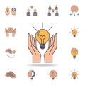 hands and a light bulb fild color icon. Detailed set of color idea icons. Premium graphic design. One of the collection icons for Royalty Free Stock Photo