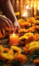 Hands lighting candle between flowers on graves. Generative Ai. Royalty Free Stock Photo