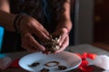 Hands lighting an incense, cleansing ritual, spiritual beliefs, white magic