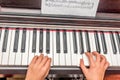 Hands of a little girl playing the piano Royalty Free Stock Photo