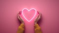 Hands make a neon heart for Valentine's Royalty Free Stock Photo