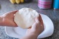 Hands making arepas in the kitchen. Latin food Royalty Free Stock Photo