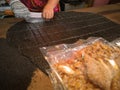 Hands making homemade sesame bars